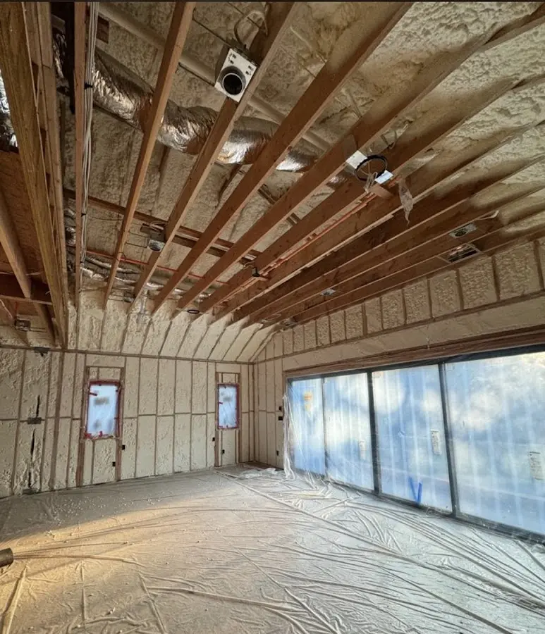 Interior walls and ceiling insulated with spray foam during new construction in Cocoa West